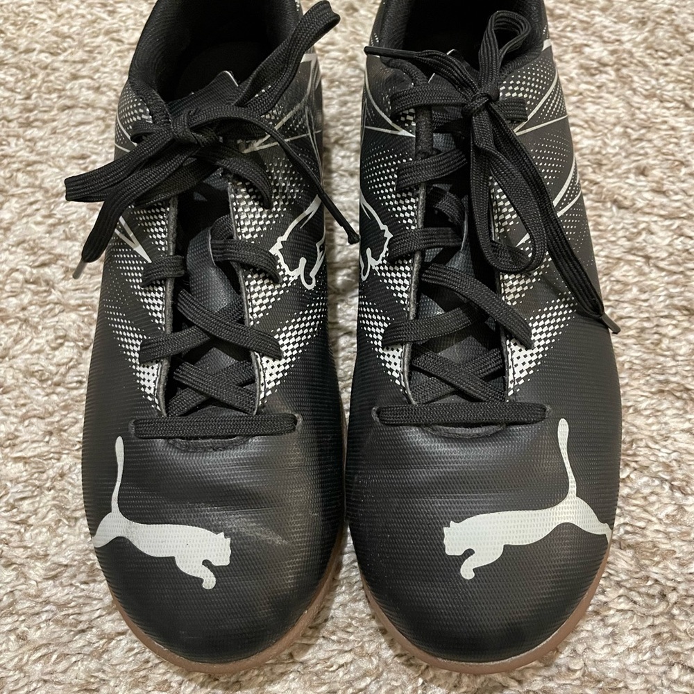 Puma Black and White indoor soccer shoes